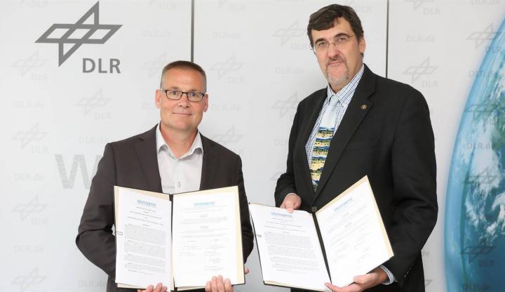 Prof. Dirk Heinrichs und André Dzikus verkünden offiziell Kooperation zwischen DLR und UN-Habitat